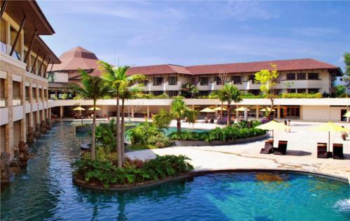 a view of a resort with a swimming pool at The Singhasari Resort Batu in Batu