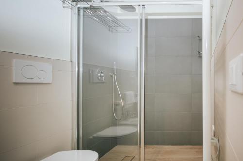 Kylpyhuone majoituspaikassa Aparthotel Touring