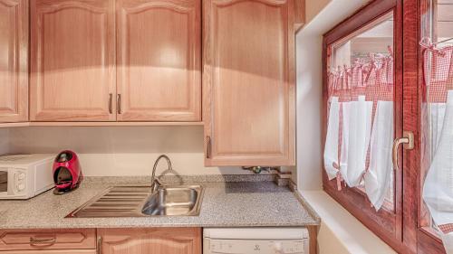 Kuchyň nebo kuchyňský kout v ubytování Saplan Real Estate ARTIGA