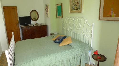 Letto o letti in una camera di B&B VILLA ELISA