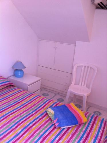 Postel nebo postele na pokoji v ubytování Rosa Marina Frontline Beach