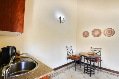 Dapur atau dapur kecil di Zebula Golf Estate & Spa Executive Holiday Homes