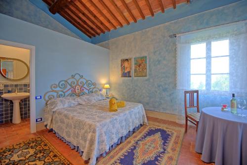 Katil atau katil-katil dalam bilik di Villa Lorenza by PosarelliVillas