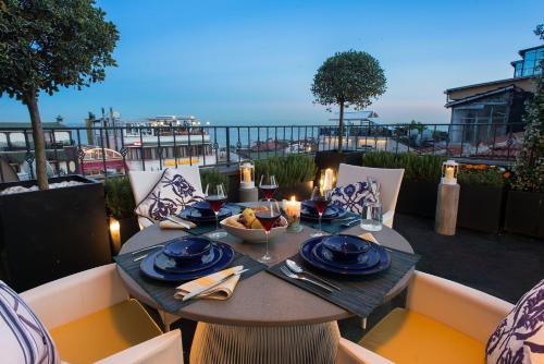a table on a patio with a view of the ocean at Istanbul Irini Seaview House in Istanbul