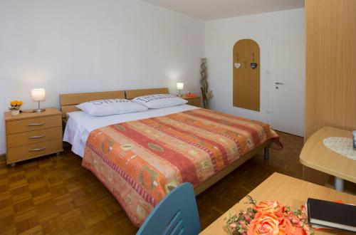 Postel nebo postele na pokoji v ubytování City getaway - apartment Ileora