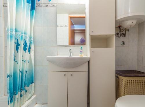 Ένα μπάνιο στο Apartment Arena