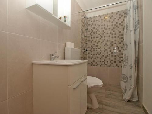 Kúpeľňa v ubytovaní Apartments Davor 1676