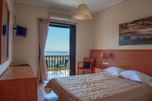 Katil atau katil-katil dalam bilik di Corali Hotel