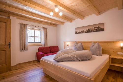 Postel nebo postele na pokoji v ubytování Appartement Reischerhof