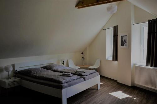 Ένα ή περισσότερα κρεβάτια σε δωμάτιο στο Penzion a relax centrum Andělka