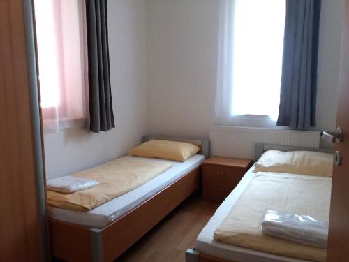 Postel nebo postele na pokoji v ubytování Apartment Riviera 503-8 Lipno Home