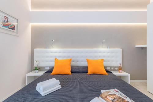 Tempat tidur dalam kamar di Appartamento Valeria by Wonderful Italy