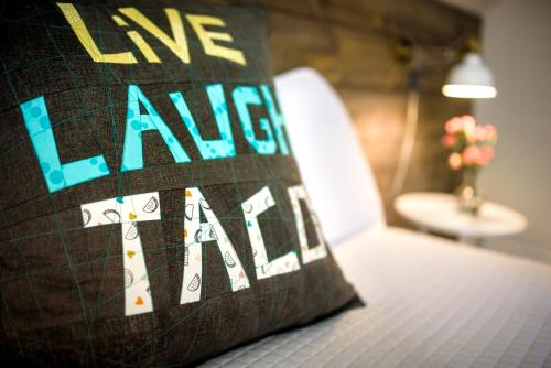 a sign that says life lane on a table at The Kitch'inn - Boutique Inn and Wine Bar in Mahone Bay