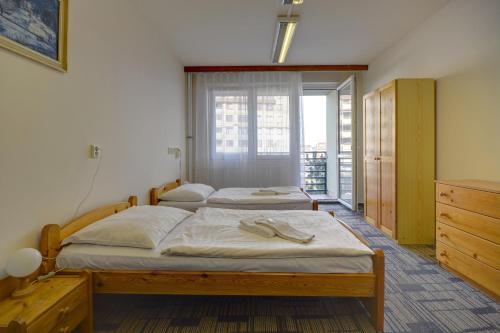 Una cama o camas en una habitación de Volha