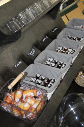 three boxes ofocolates sitting on a table at le tout va bien in Valence-dʼAgen