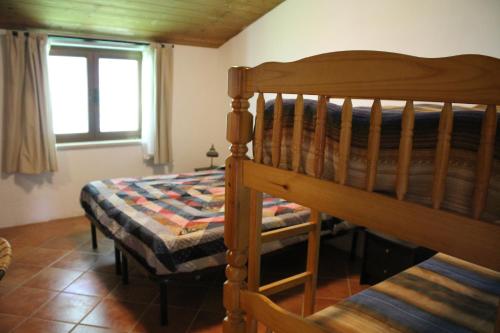 Postel nebo postele na pokoji v ubytování Bosco delle Rune ..un angolo di paradiso