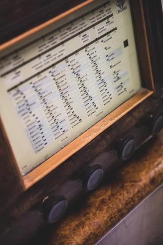 an old radio with a menu on the screen at Residence Daniele in Bellaria-Igea Marina
