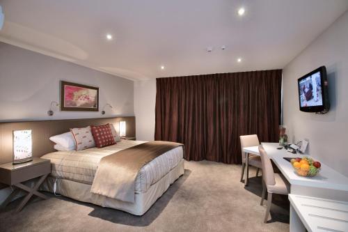 Voodi või voodid majutusasutuse The St James Premium Accommodation toas
