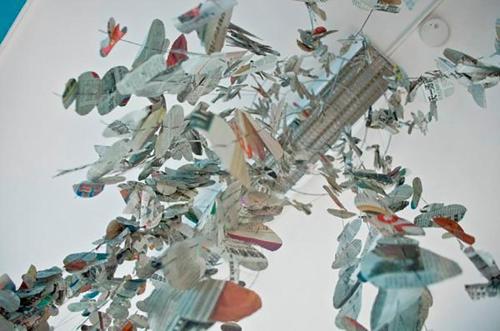 a bunch of toy planes hanging from a ceiling at Villa Art'è in Locarno