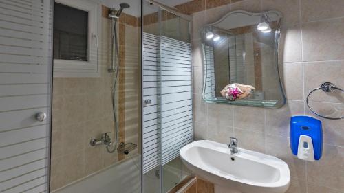Kylpyhuone majoituspaikassa Pothos Villas