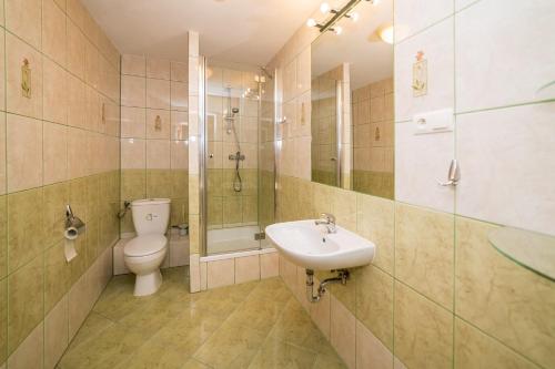 Kúpeľňa v ubytovaní Apartamenty Słoneczne Wzgórze