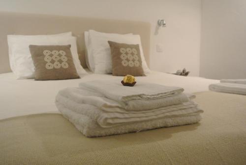 A bed or beds in a room at Casas Do Contrabando