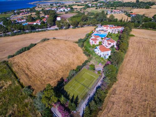 an aerial view of a large house on a hill at Aeolian Gaea Hotel in Skala Kallonis