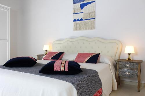 Ogliastra Luxury Apartment房間的床