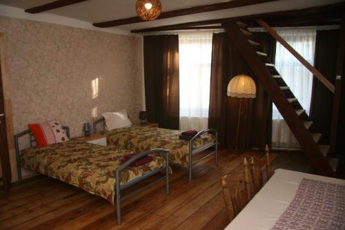 Postel nebo postele na pokoji v ubytování Lība Apartments