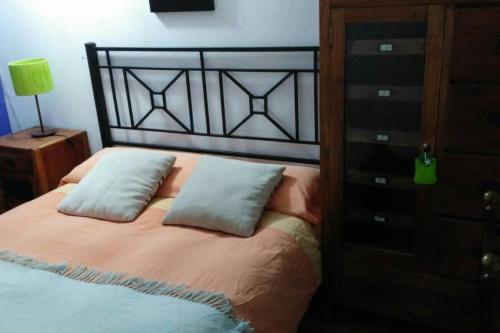 En eller flere senger på et rom på Apartamento El Cielo de Jesi