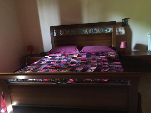 Кровать или кровати в номере Appartamenti Vallecchia