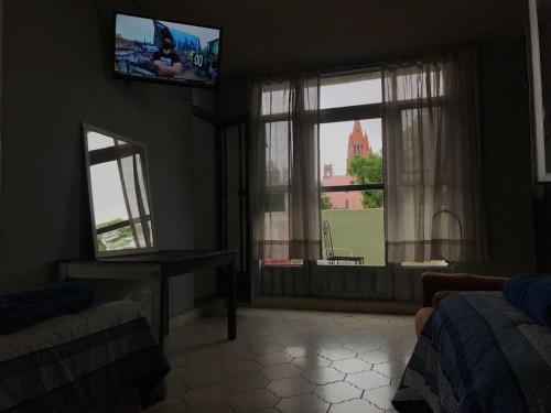 TV a/nebo společenská místnost v ubytování Casa Antaña