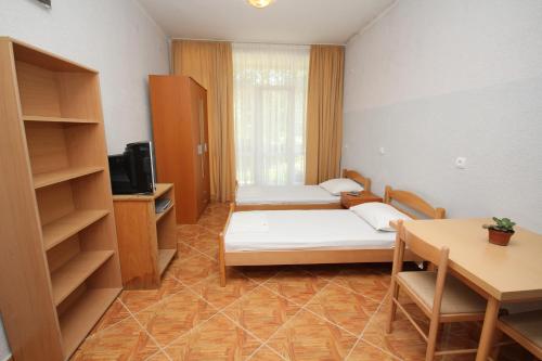 Ein Bett oder Betten in einem Zimmer der Unterkunft Apartments DEA
