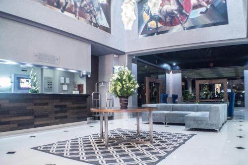 Гостиная зона в Pueblo Amigo Hotel Plaza y Casino