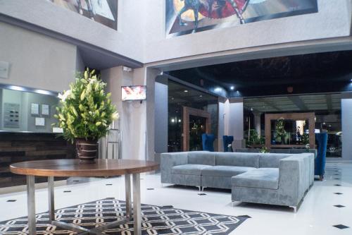 Гостиная зона в Pueblo Amigo Hotel Plaza y Casino