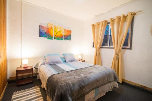 Ein Bett oder Betten in einem Zimmer der Unterkunft Cabañas Neuquen