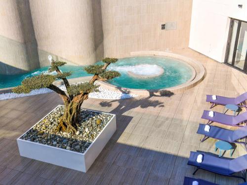 Ein Sitzbereich in der Unterkunft ibis styles La Rochelle Thalasso Chatelaillon