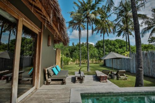 Ein Garten an der Unterkunft Slow - Private Pool Villas & Spa