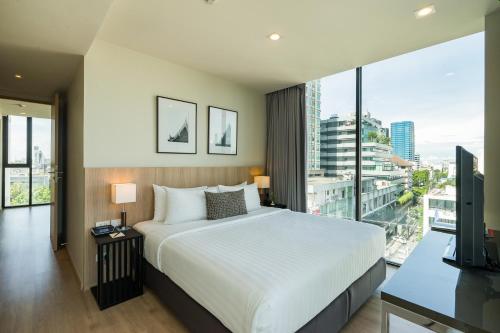 Katil atau katil-katil dalam bilik di The Residence on Thonglor by UHG