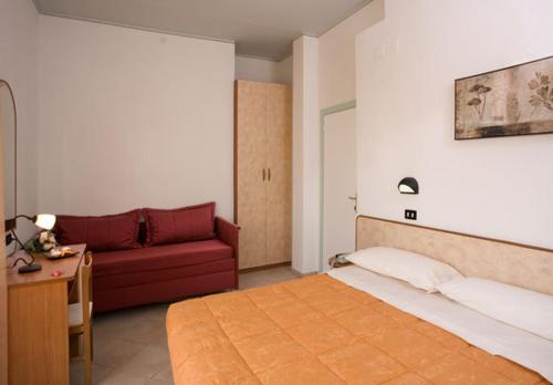 En eller flere senger på et rom på Hotel Verdemare