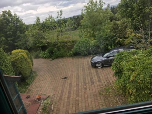 a car parked in a brick parking lot at Beacon View in Penrith