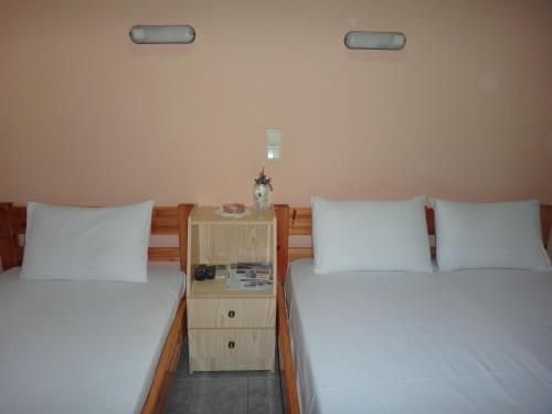Ένα ή περισσότερα κρεβάτια σε δωμάτιο στο Despoina Apartments