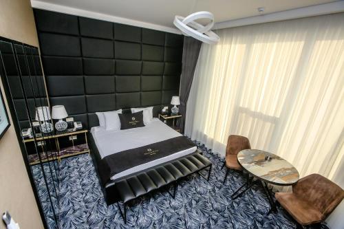 Armada Villa Hotelにあるベッド