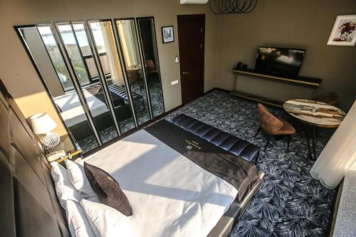 Armada Villa Hotelにあるベッド