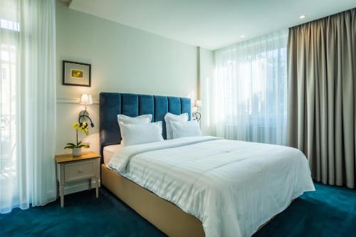 Hotel Residence Promenadeにあるベッド