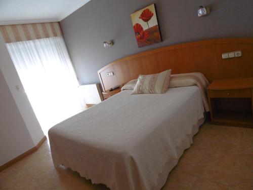 Cama o camas de una habitación en Hotel Miramar 2** Superior