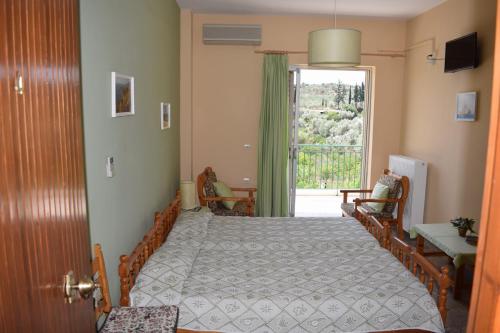 Katil atau katil-katil dalam bilik di Apartments Rania