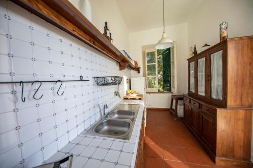 Кухня или мини-кухня в Villa Cosimo
