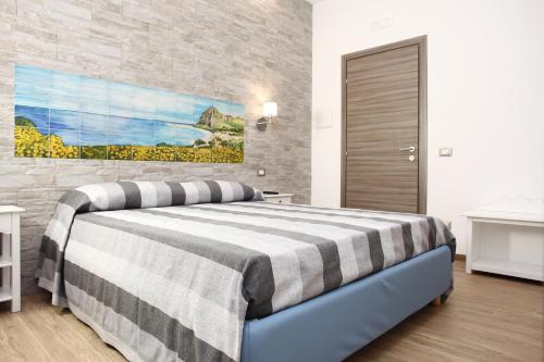 Ένα ή περισσότερα κρεβάτια σε δωμάτιο στο Ninni e Fede