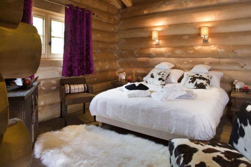 Katil atau katil-katil dalam bilik di Chalet de luxe "Lodge des Sens" - Jacuzzi & Sauna - 12 pers